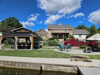 Stunning Lakefront Home - Original 1800’s Cabin - Relax by The Water - 4-Star