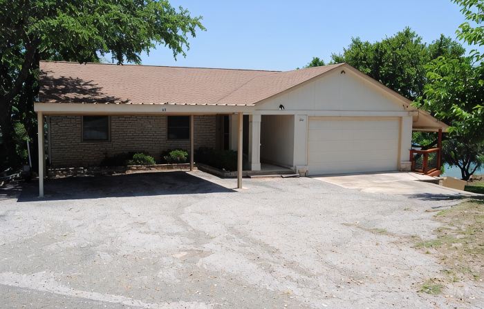 Lake Front property on Inks Lake with beautiful lake views /dock/swimming area.