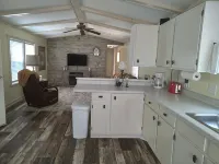 Cozy nestled in quiet neighborhood. On snowmobile and ATV trail.