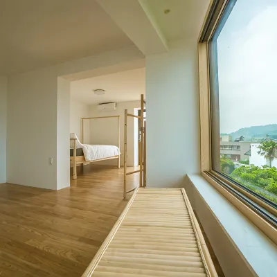 Jeju Backpaecus Villa โรงแรมใกล้หิน Jeolbuam Rock