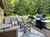 Spacious five-bedroom home off Back Lake with direct trail access on Spooner Rd