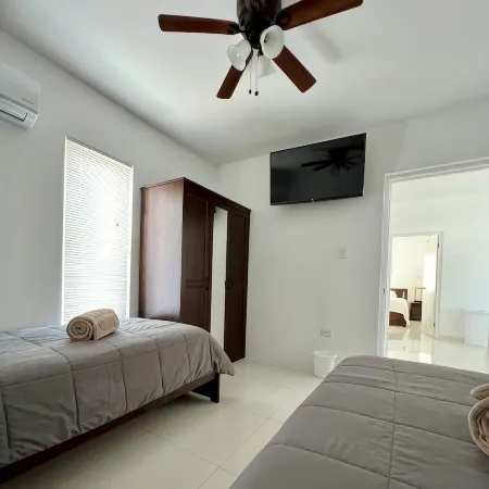 Located Only Minutes Away from the Palm Beaches. 3 Bedroom 4 Beds 2 Bath
