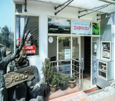 Achus Inn Отели в г. Нью Колони