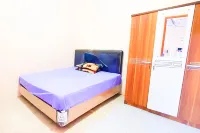 Green Kanca Syariah Guest House Mitra RedDoorz Hotel dekat GERBANG POS 1 - BHAKTI ALAM