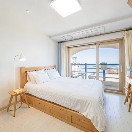 Jeju Dalbitgoun Pension Отели рядом с достопримечательностью «Пляж Вольчжон»