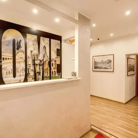 Top Floor Colosseo Guesthouse Отели рядом с достопримечательностью «Базилика Санта-Парасседе»