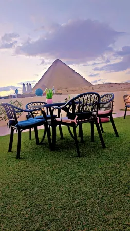 Solima Pyramids Inn Отели в г. Nazlet El-Semman