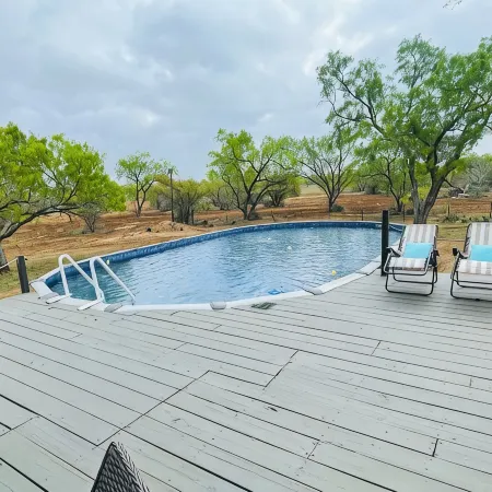 Ranch house, cottage, pool, deck, small basketball court, private gated entrance