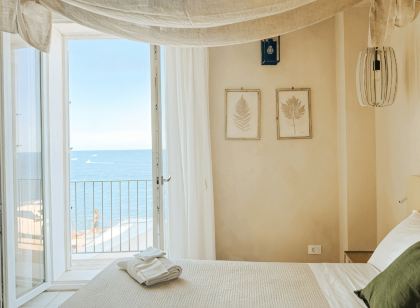 Palazzo Russo Suite & Apartments