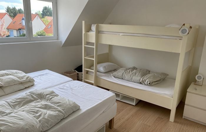 Pleasant house in quiet neighborhood with garage and fenced garden.