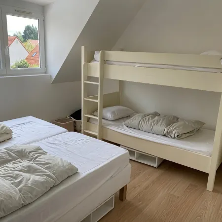 Pleasant house in quiet neighborhood with garage and fenced garden.