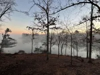 Modern lakefront cabin nestled in the piney woods of East Texas. Pet Friendly! Hotels in Camp County