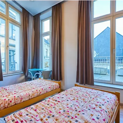 Jacques Brel Hostel Отели рядом с достопримечательностью «Ле Ботаник»