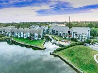 Resort Style Serenity on Lake Conroe: Tennis, Lake-Side Pool, Gym, Marina