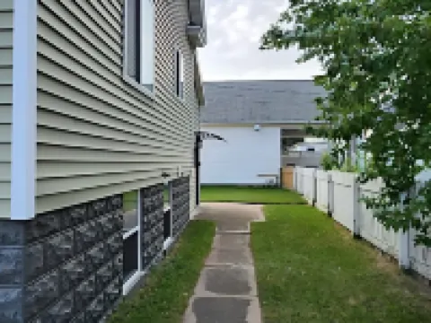 Charming 2-bedroom house with WiFi, AC in cool Escanaba Hotels in Escanaba