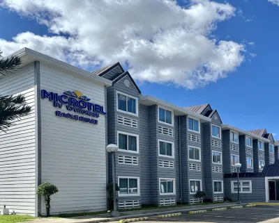 Microtel by Wyndham Eagle Ridge Отели в г. 