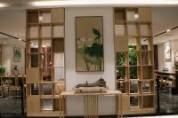 Puer Jiusi Suyuan Hotel - bar