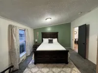 Quiet. Relaxing. 4-bedroom House with AC, Jetted Tub and WiFi.