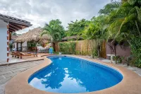 Spacious 3-Bedroom Villa. with a pool, rancho- STEPS away from Langosta Beach. - Villas