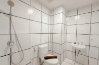 Combined Grey Toned 2BR Apartment at The City Square Surabaya By Travelio - Lejligheder