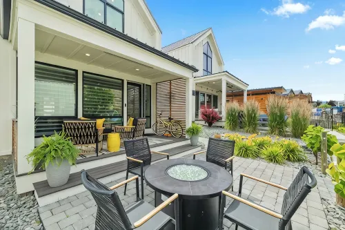 Outdoor Heater & Covered Patio, Paddle Boards, Fire Table, Bikes, Outdoor Games