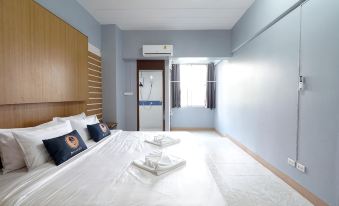 RoomQuest Sps Hotel and Residence