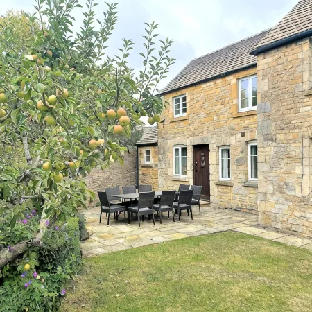Roseleigh Cottage in the heart of Stow-on-the-Wold with parking for 2 cars.