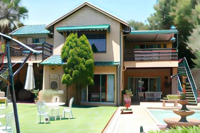 Greenfields Guesthouse & Restaurant Отели в г. Альбертон