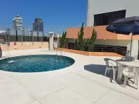 Cosmopolitan Praia Flat - piscina