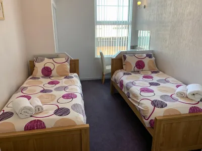 Austins Guest House Hotels near Sophia Gardens