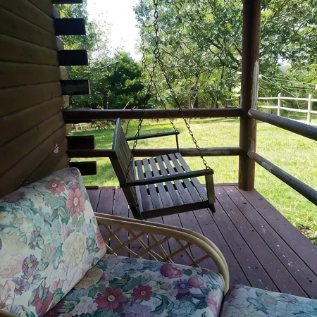 Cedar Log Cabin home on wooded bluff nestled between Springfield and Branson