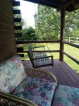 Cedar Log Cabin home on wooded bluff nestled between Springfield and Branson