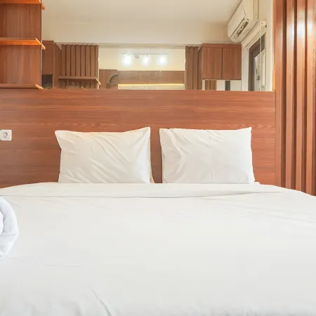 Relaxing and Homey Studio Transpark Cibubur Apartment By Travelio