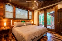 Ultimate Group Getaway: Modern Cabin w/ Hot Tub, Foosball, Playset & Arcade - 5-Star