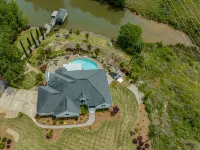 Beautiful Waterfront Home with abundant outdoor seating, pool, hot tub, grill - Homestays