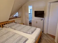 Thatched house with Southwest-terrace, centrally located, near to beach - 3-Star