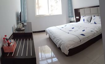 Tianxing Business Hotel (Ye Sanpo Scenic Area)