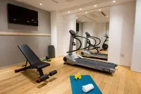 Hotel Dimorae Rooms and Suites - Apartments - gimnasio