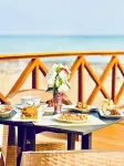 Coconut Pointe Villa & Beach Resort - breakfast