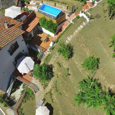 Vacation home with hillside view and pool