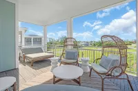 Coastal Luxe Villa! Tranquil 3-Story Retreat with Bay Views near Anna Maria Isl
