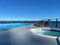 Beach Bliss Oceanfront King Suite! Stunning View, Patio, Dock, Pool & Hot Tub! - Beach