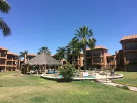 PARADISE AT BAHIA DELFIN / BEAUTIFUL  1ST FLOOR, POOLSIDE, OCEANVIEW , GOLD ZONE - โฮมสเตย์