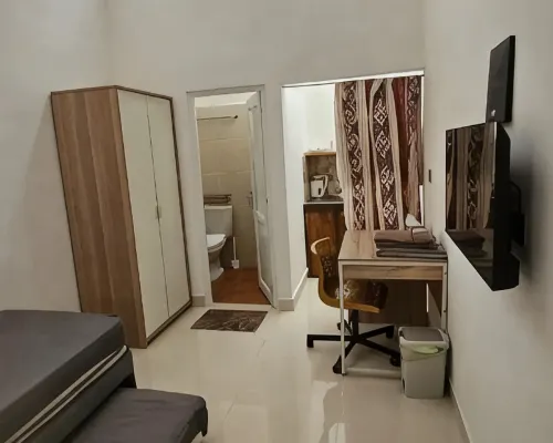 Cute Room at Pondok Raima SYARIAH Hotels in Kebomas