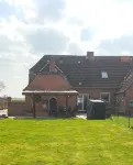 Gemütliches Ferienhaus mit Whirlpool, Sauna und Garten mit Deichblick - Homestays