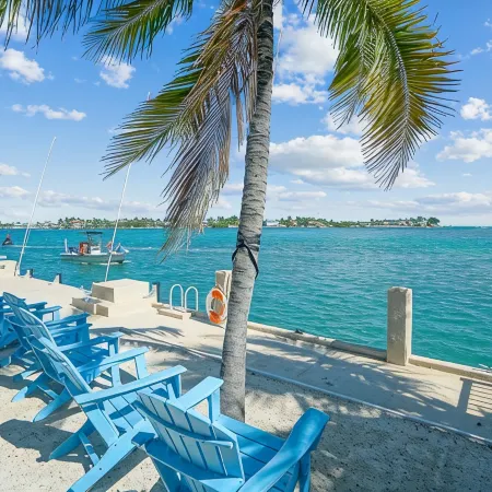 Oceanfront PARADISE w Heated pool, 55’ dock, ocean view & bathroom in every room