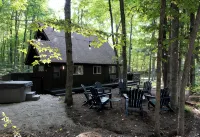 Serene chalet with fire pit, hot tub and barrel sauna in Shanty Creek - Chalets