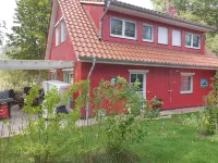 ~ Color magic red in Conneforde ~ with large terrace, garden, sauna, - Wi-Fi