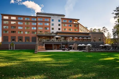 The StateView Hotel, Autograph Collection Hotel in zona Poole College of Management at North Carolina State University