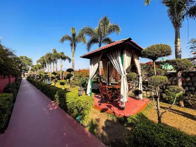 尼拉吉河森林整體健康水療度假村 尼爾坎特·馬哈德夫神廟附近的飯店